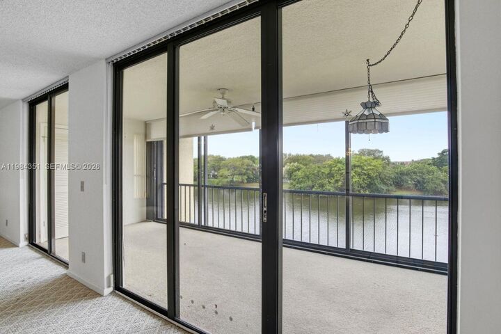 Property Photo:  5188 Woodland Lakes Dr 337  FL 33418 