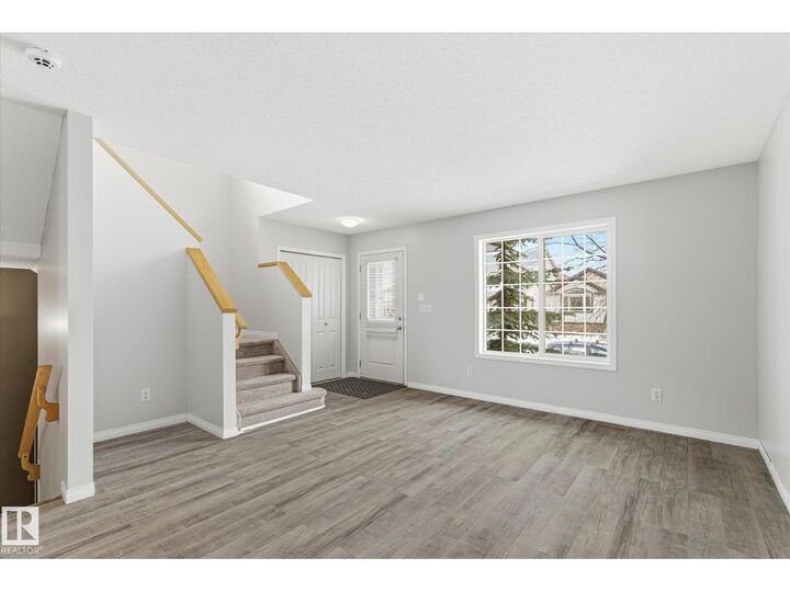 Property Photo: 424 Songhurst Pl AB T9E 0P9