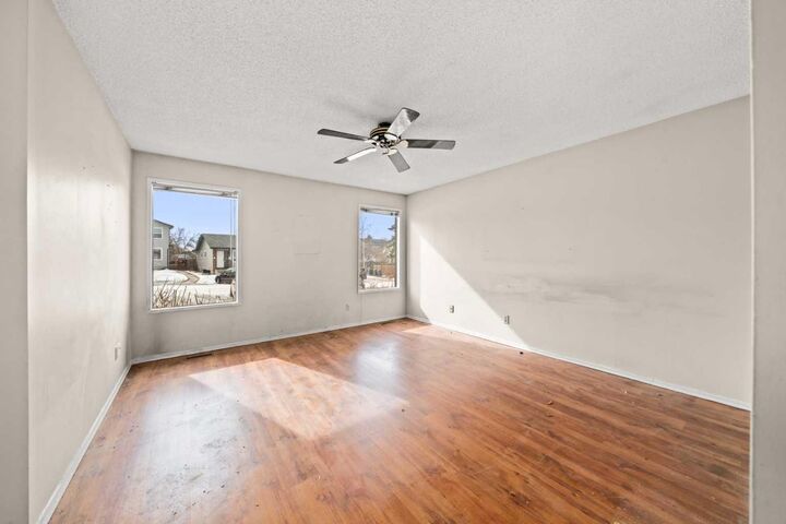 Property Photo:  151 Deerview Court SE  AB T2J 6B6 