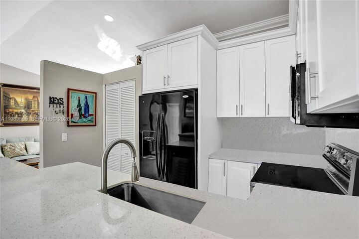 Property Photo:  6405 SW 152nd Cir Pl 10-05  FL 33193 