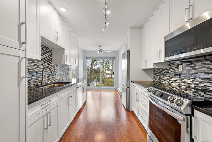 Property Photo:  9905 Fifth St 205  BC V8L 2X6 