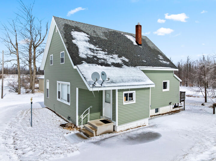 Property Photo:  11825 Meridian Line Road  MI 49751 