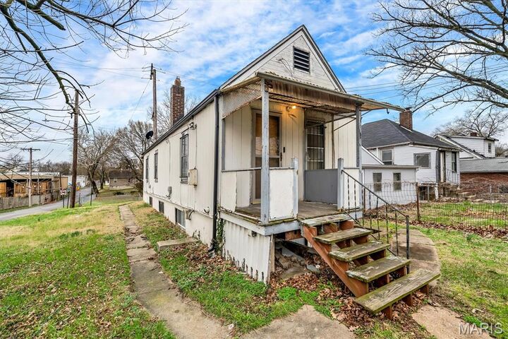 Property Photo:  6401 Jesse Jackson Avenue  MO 63121 