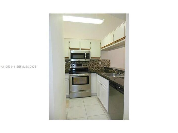 Property Photo:  9061 SW 141st Pl 9061  FL 33186 
