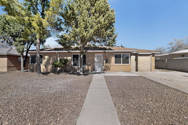 Property Photo: 8715 Claremont Avenue NE NM 87112