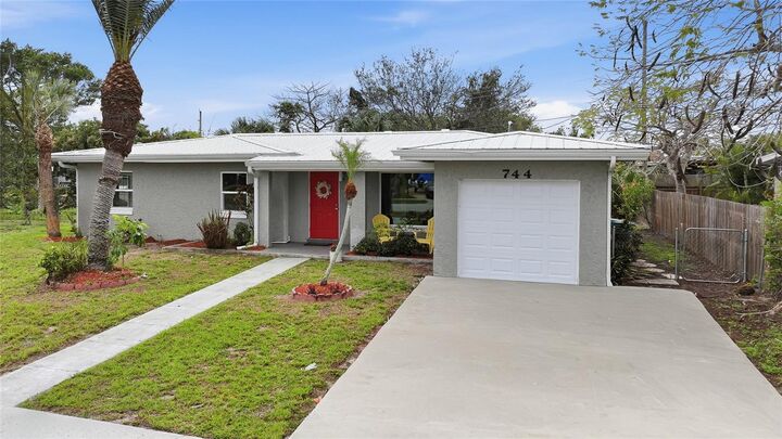 Property Photo:  744 Conreid Drive NE  FL 33952 