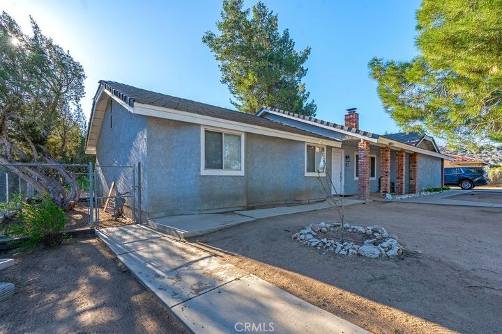 Property Photo:  7365 Chase  CA 92345 