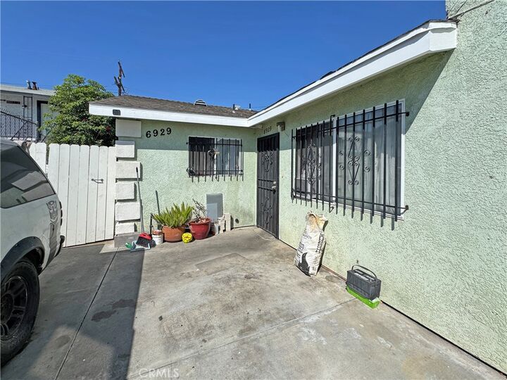 Property Photo:  6927 Estrella Avenue  CA 90044 