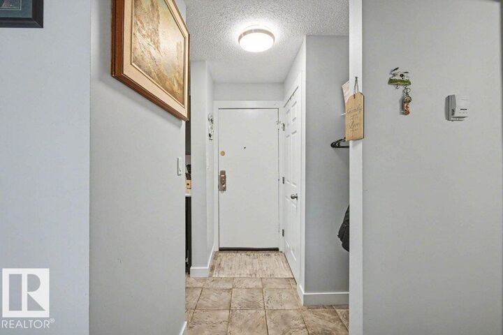 Property Photo: 15105 121 Street NW 102 AB T5X 2G3