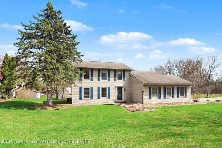 Property Photo: 5730 Whisperwood Drive MI 48840