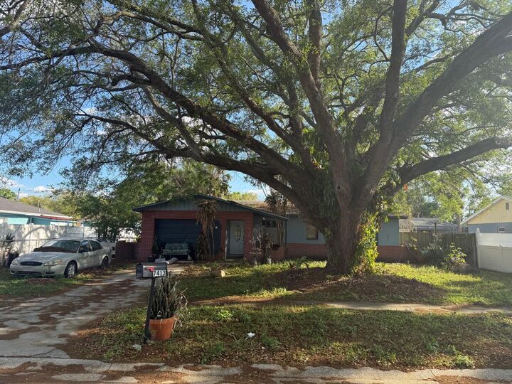 Property Photo:  7413 Aripeka Drive  FL 33619 