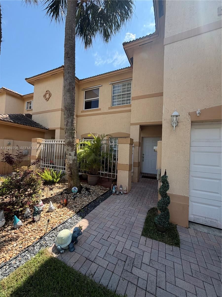 Property Photo:  809 NW 170th Ter 26  FL 33028 