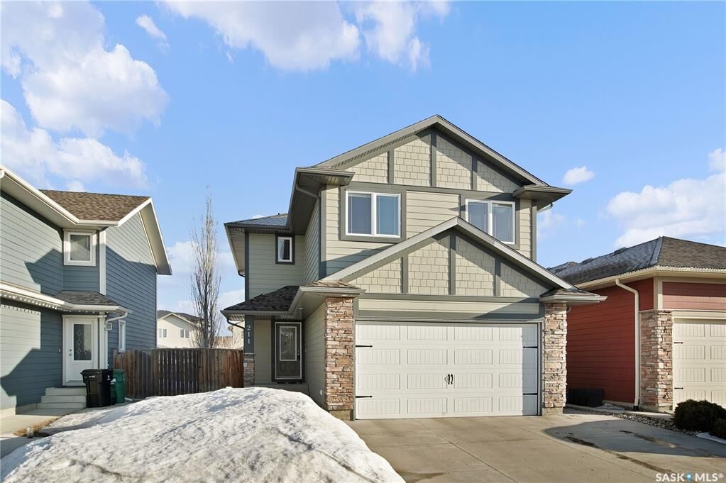 Property Photo:  211 McBeth Crescent  SK S7T 0K5 