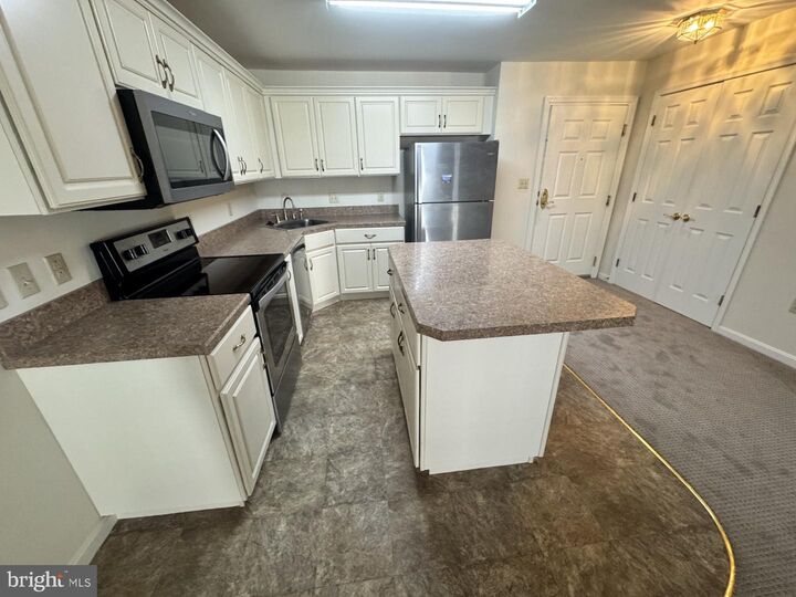 Property Photo:  1103 S Schumaker Drive C-303  MD 21804 