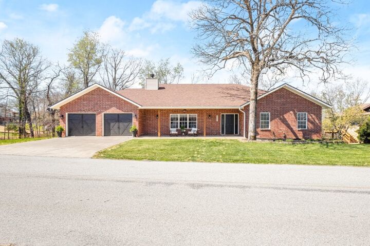 Property Photo:  8225 Old White River Road  AR 72756 
