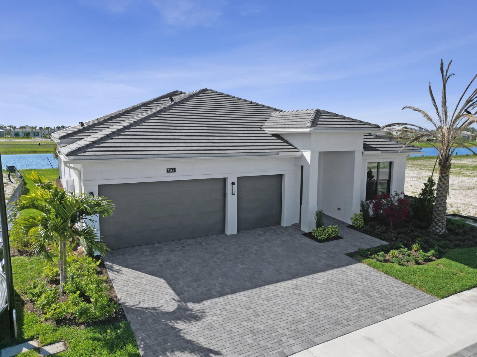 Property Photo:  5183 Rivo Alto Circle  FL 33470 