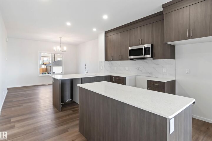 Property Photo: 5452 Hawthorn Run SW AB T6X 3K6