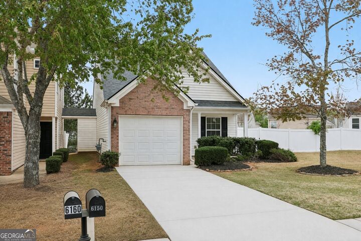 Property Photo: 6150 Smoke Ridge Lane GA 30041