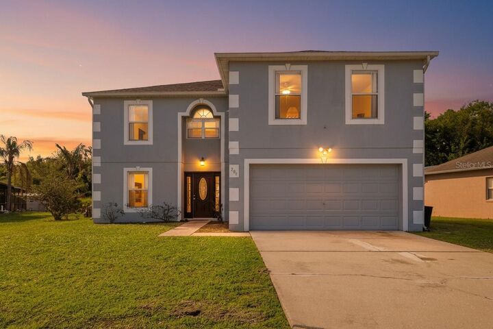 Property Photo:  206 Taranto Way  FL 34758 
