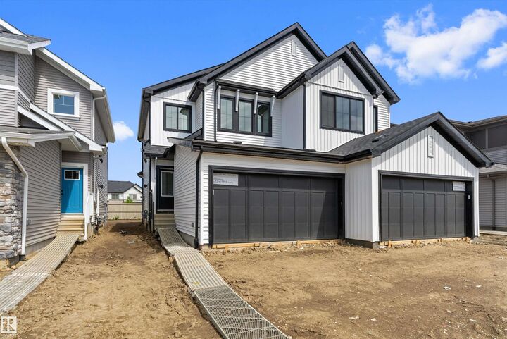 Property Photo: 1054 Cristall Crescent SW AB T6W 5S6