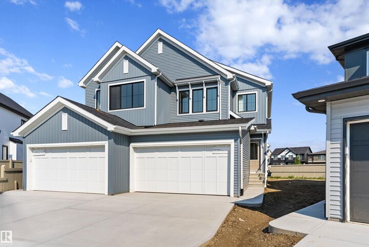 Property Photo: 1064 Cristall Crescent SW AB T6W 5S6