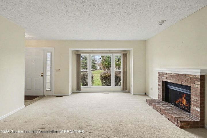 Property Photo:  7315 Chellmar Drive  MI 48917 