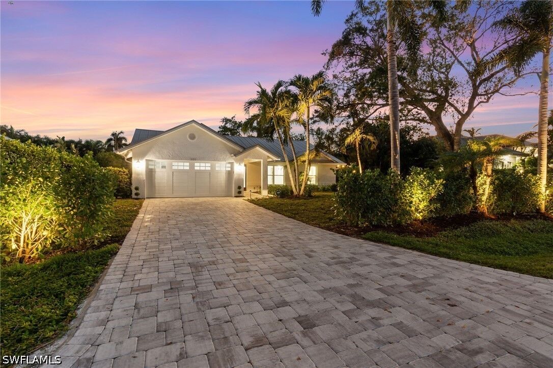 Property Photo:  1200 Cypress Woods Drive  FL 34103 