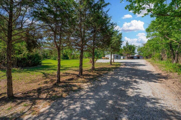 Property Photo: 9901 E 103rd St S KS 67110