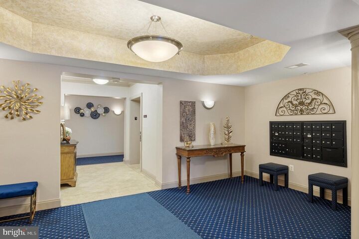 Property Photo:  8605 Wandering Fox Trail 203  MD 21113 