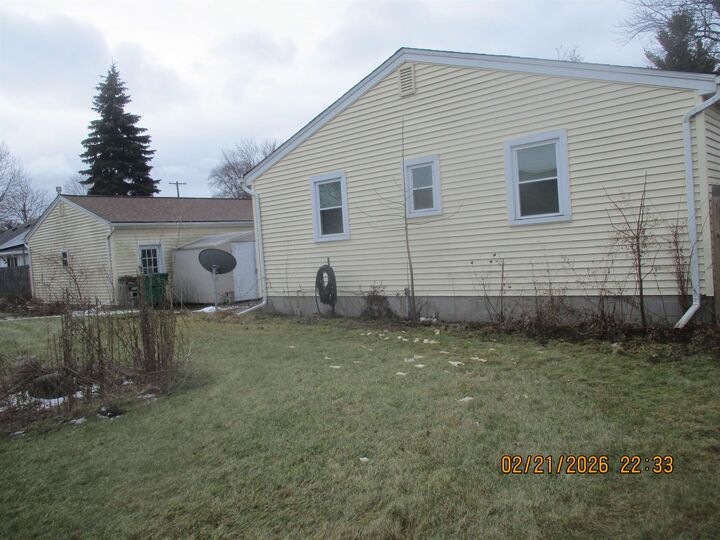 Property Photo:  414 Cambridge Street  MI 48708 