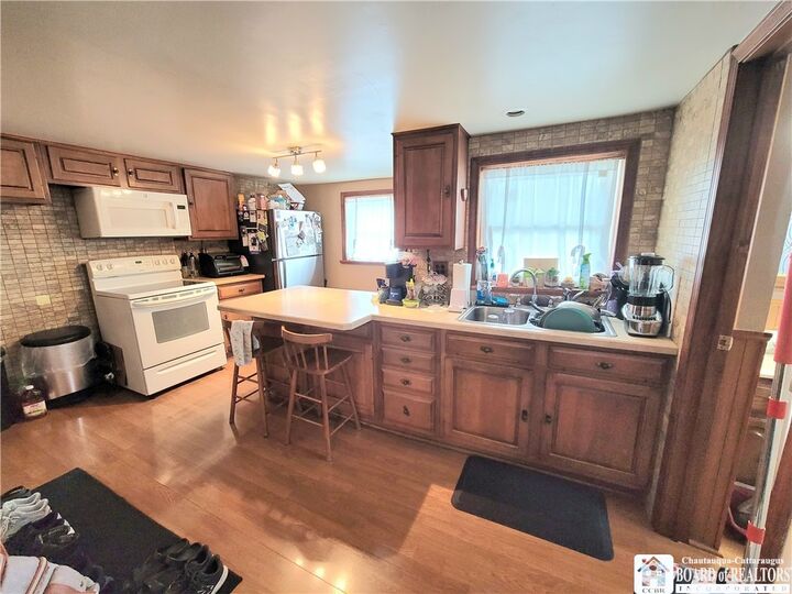 Property Photo:  423 Bucknor Street  NY 14048 