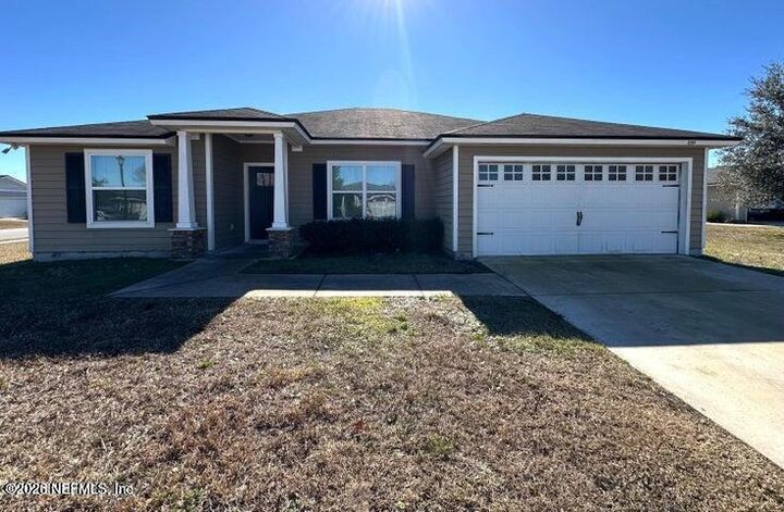Property Photo: 9296 Canary Ivy Lane FL 32219