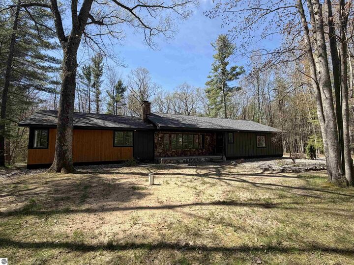 Property Photo: 10852 NE Black Bear Road MI 49646