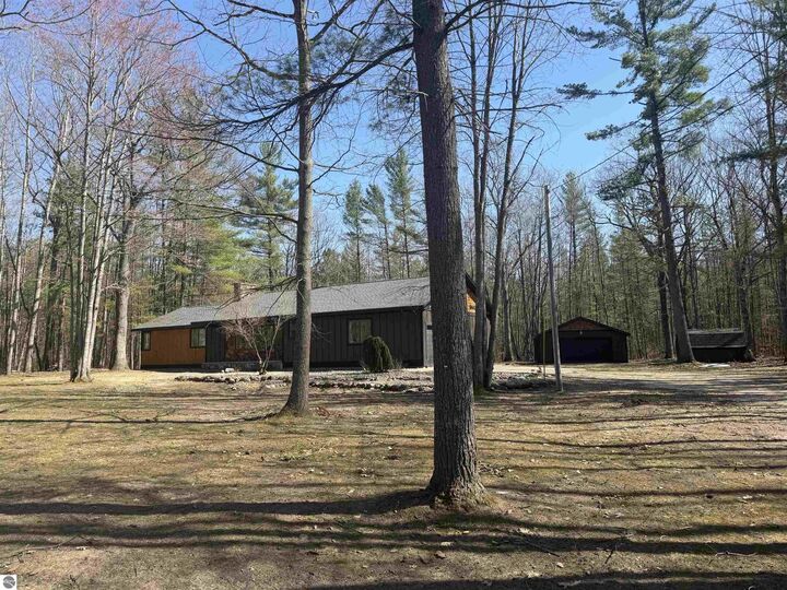 Property Photo:  10852 NE Black Bear Road  MI 49646 