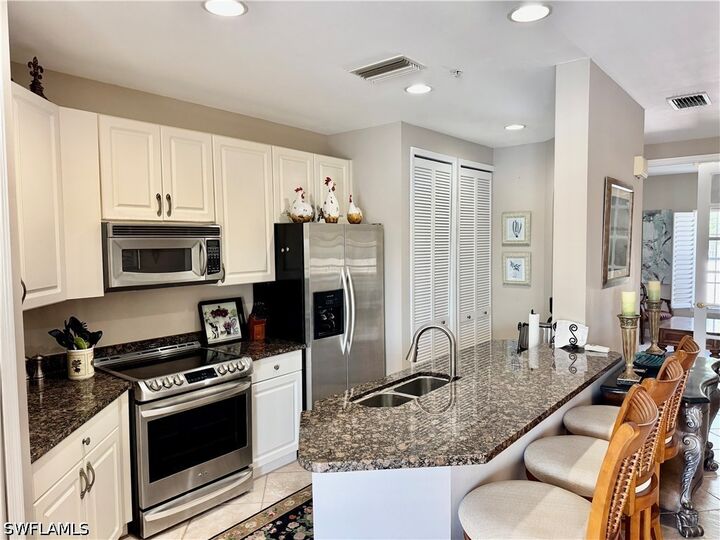 Property Photo:  1390 Sweetwater Cove 203  FL 34110 