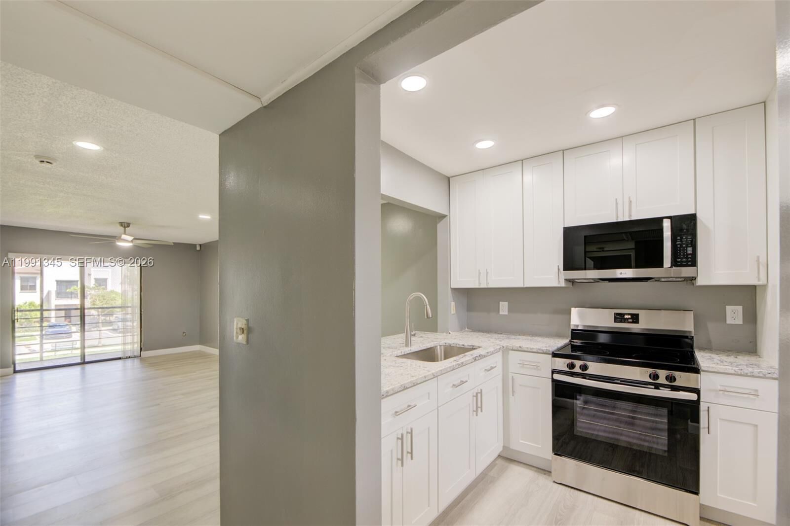 Property Photo:  851 NE 209th Ter 203-23  FL 33179 