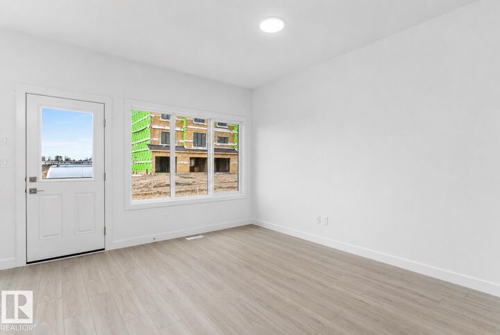 Property Photo: 18717 18A Avenue NW AB T9G 0M7