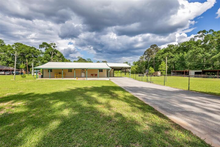 Property Photo: 7476 S Fork Drive TX 77303