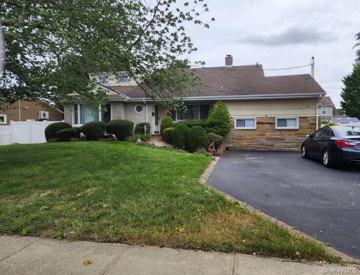 Property Photo:  67 Unqua Road  NY 11758 