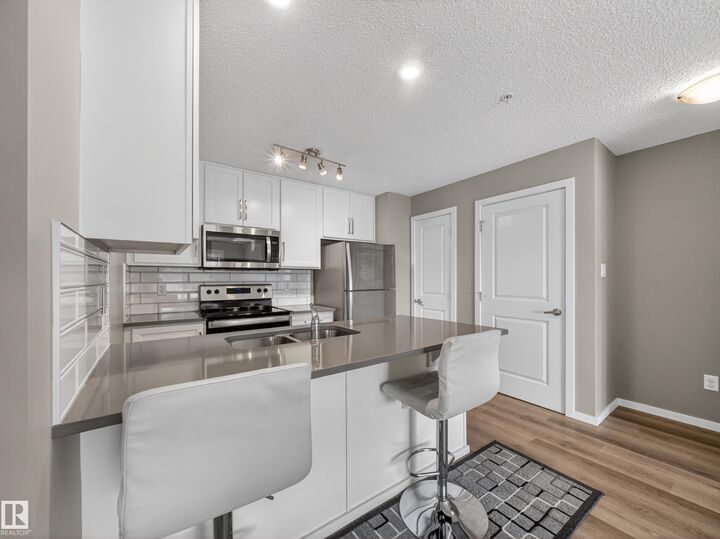 Property Photo: 148 Ebbers Boulevard NW 124 AB T5Y 4A4