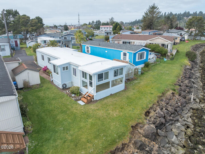 Property Photo: 955 NE Mill St E9 OR 97394