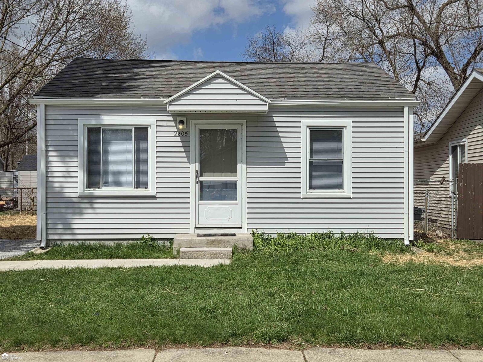 Property Photo:  2205 E Whittemore Avenue  MI 48529 