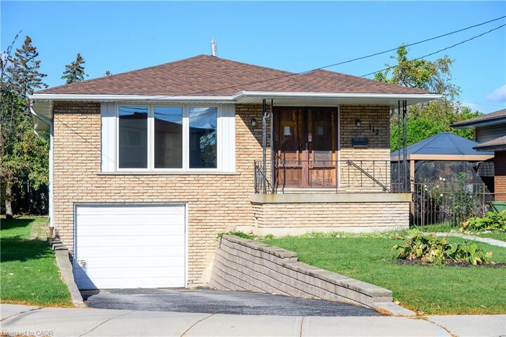 112 Purdy Crescent — photo 1