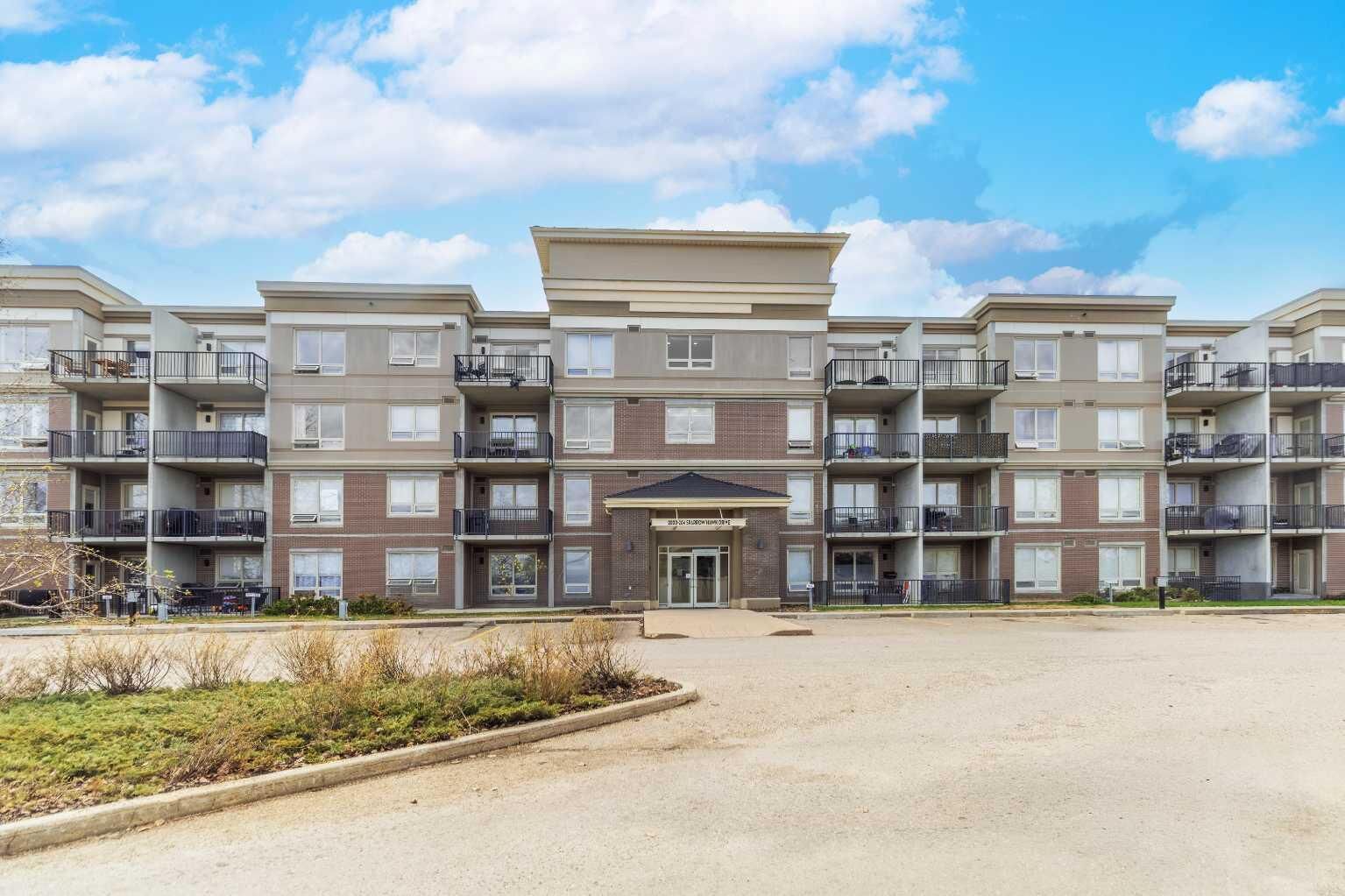 Property Photo:  204 Sparrow Hawk Drive 2117  AB T9K 0P1 