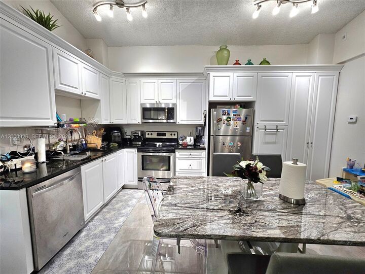 Property Photo:  841 Lyons Rd 24205  FL 33063 