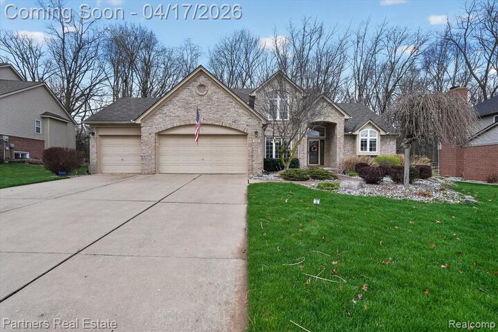 Property Photo:  112 Summer Shade Drive  MI 48843 6000 