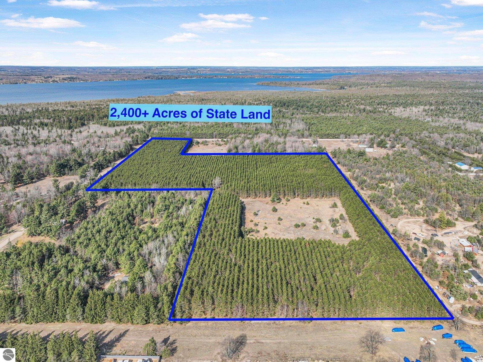 Property Photo:  7020 NW Round Lake Road  MI 49676 