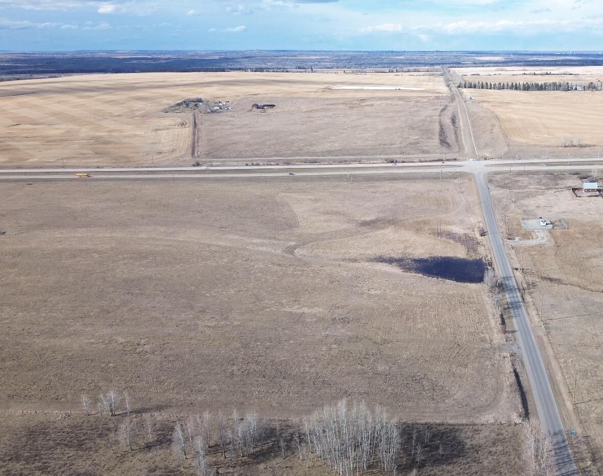 Property Photo: Hwy 22X (Spruce Meadows Trail West) &Amp 128 Street W AB T1S 0W8