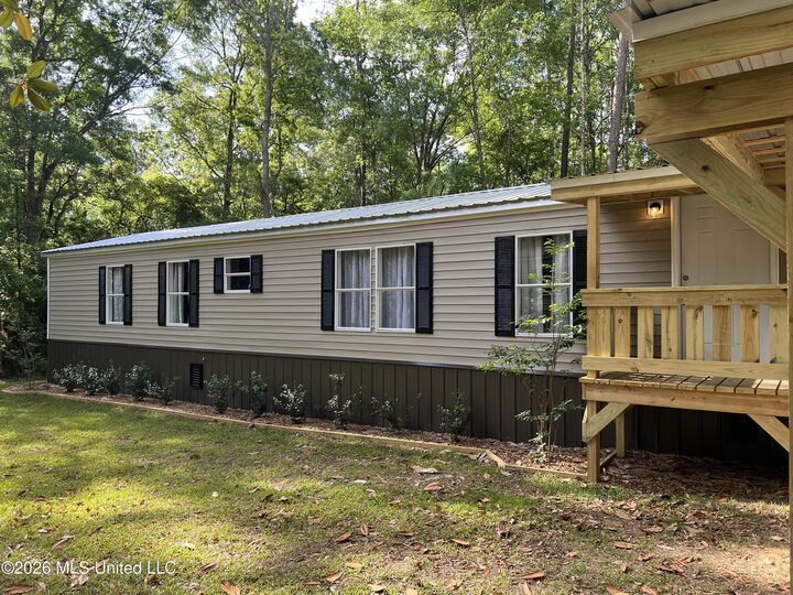 Property Photo:  9738 Limu Place  MS 39525 