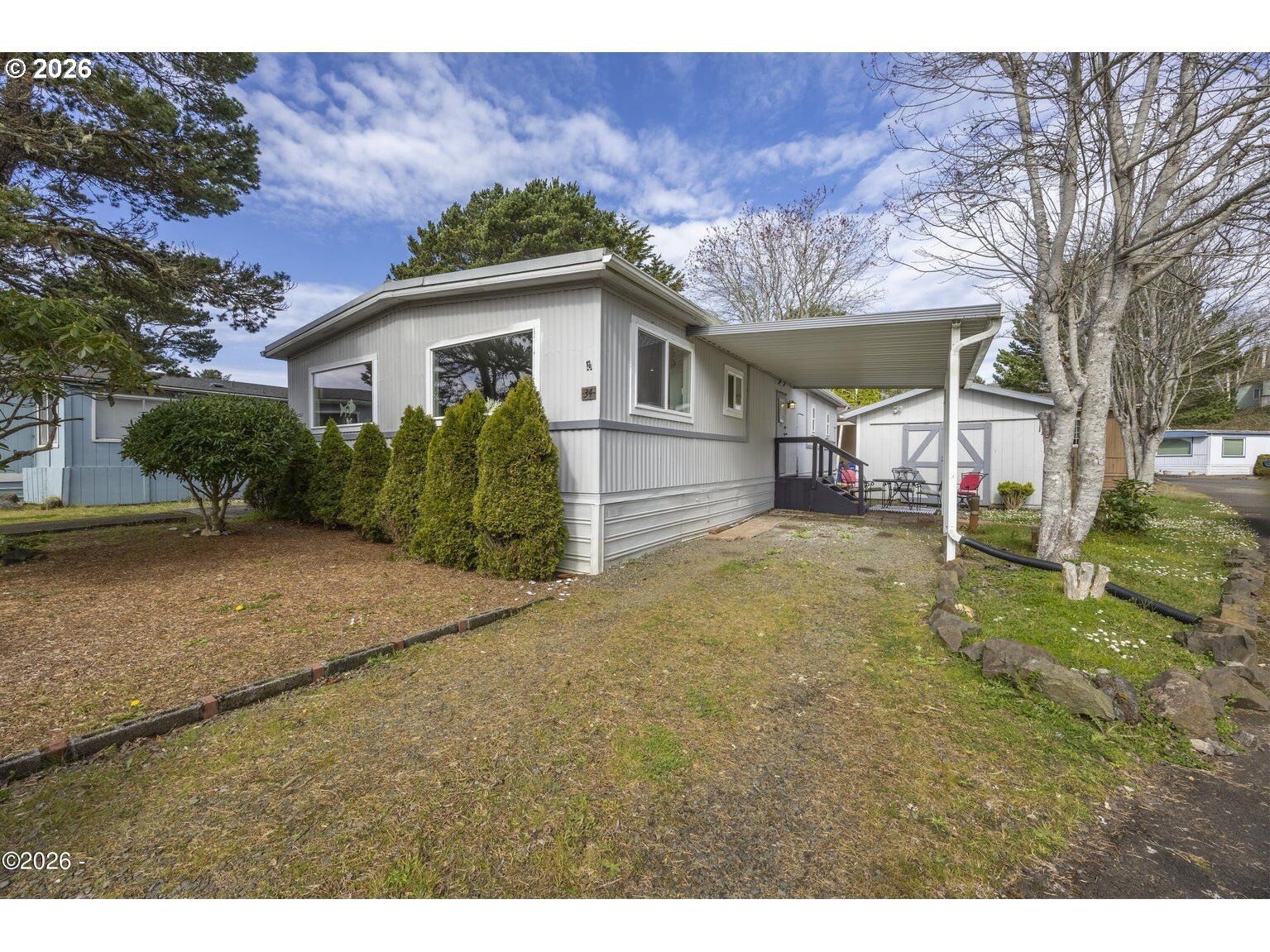 Property Photo:  4800 SE Inlet Ave 34  OR 97367 